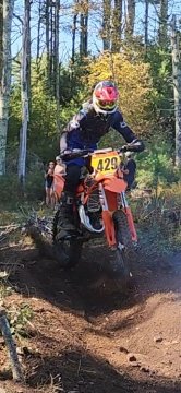  Rider catching air in the woods, ready to send it! #2025 #N...